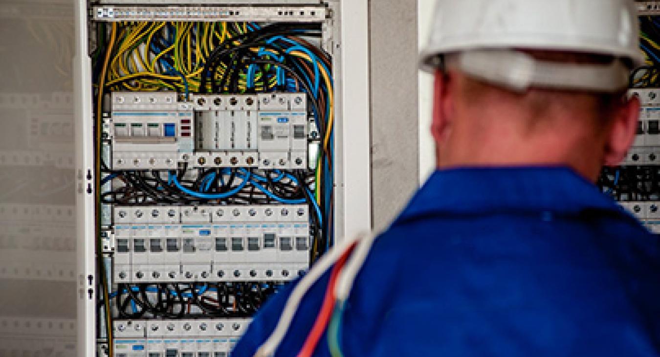 Commercial Electrician with Fuse Board