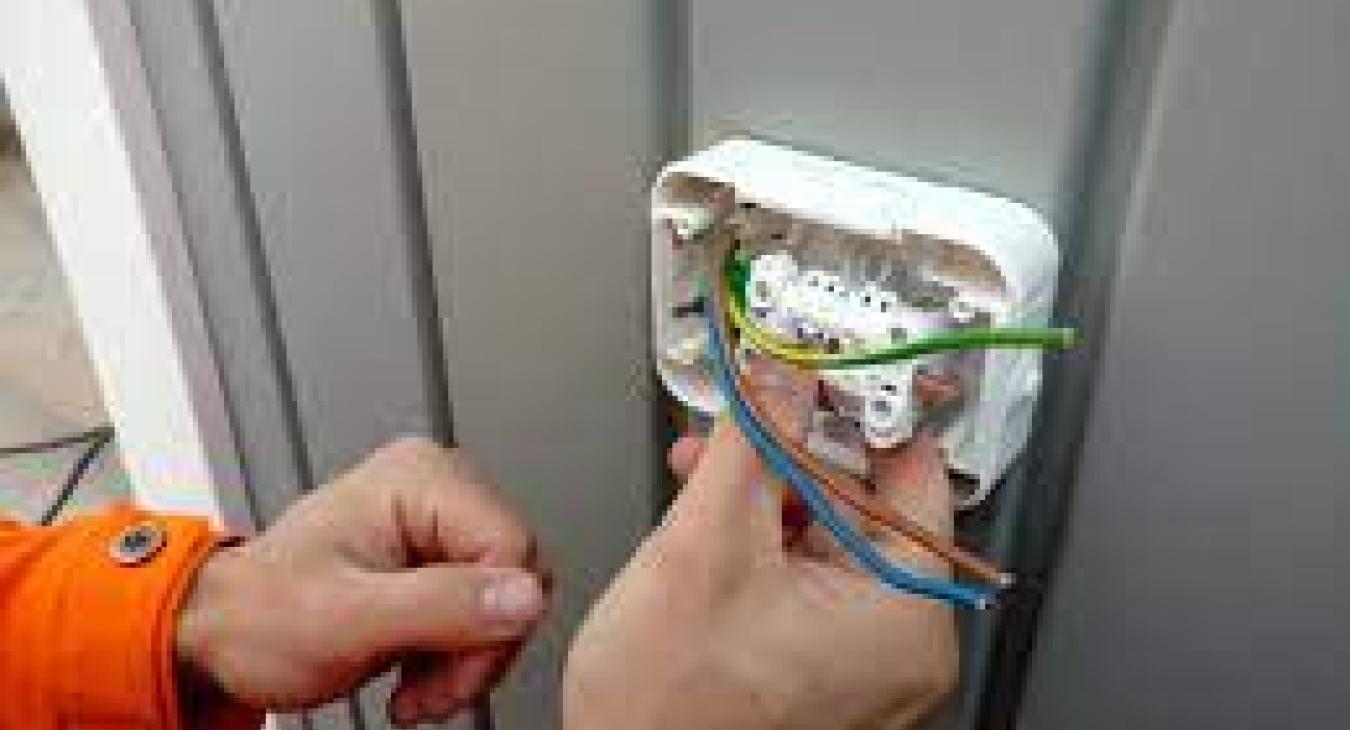 Electrician Installing Socket